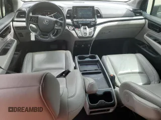 2021 Honda Odyssey Touring with VIN 5FNRL6H83MB028717, listed as a Copart auction lot 49236485 with 63,576 mi miles and Salvage Title. Bid and sale history available at carsss.com. Image 8.