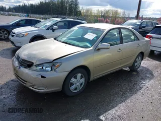 2004 Toyota Camry LE with VIN JTDBE32K440272373, listed as a IAAI auction lot 41949768 with 205,093 mi miles. Bid and sale history available at carsss.com. Image 2.