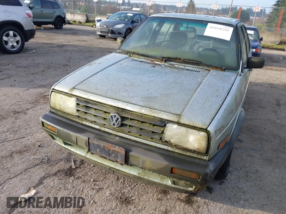 1991 Volkswagen Jetta z VIN 3VWRB21G1MM017401, wystawiony jako IAAI lot #41018295 z przebiegiem 206 316 mil mil oraz . Historia ofert i sprzedaży dostępna na DreamBid. Obrazek 6.