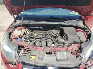 2014 Ford Focus Titanium z VIN 1FADP3N29EL409568, wystawiony jako Copart lot #62295345 z przebiegiem 53 401 mil mil oraz Szkoda całkowita • Salvage title. Historia ofert i sprzedaży dostępna na DreamBid. Obrazek 11.