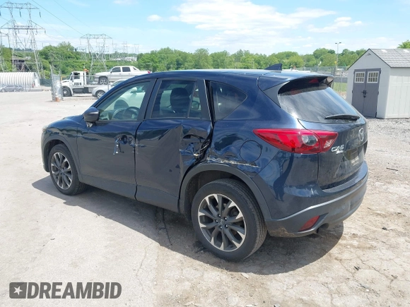 2016 Mazda CX-5 Grand Touring z VIN JM3KE4DY1G0817562, wystawiony jako IAAI lot #42289929 z przebiegiem 135 476 mil mil oraz . Historia ofert i sprzedaży dostępna na DreamBid. Obrazek 17.
