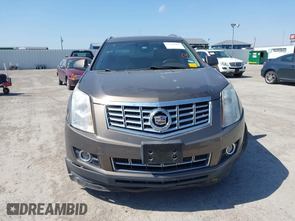 2015 Cadillac SRX Performance Collection with VIN 3GYFNCE31FS598109, listed as a IAAI auction lot 41788267 with 172,488 mi miles and . Bid and sale history available at DreamBid. Image 12.