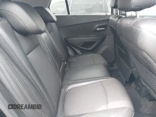 2020 Chevrolet Trax LT with VIN 3GNCJLSB8LL221077, listed as a IAAI auction lot 42421378 with 97,372 mi miles and . Bid and sale history available at DreamBid. Image 8.