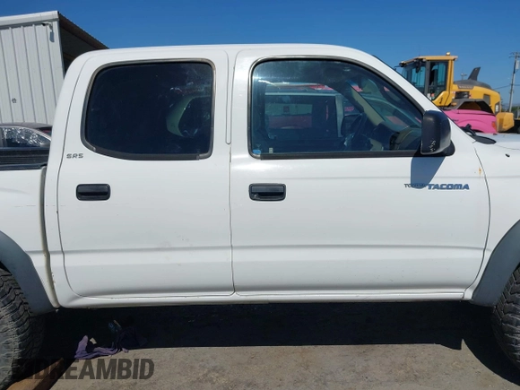 2001 Toyota Tacoma PreRunner z VIN 5TEGN92N91Z852586, wystawiony jako IAAI lot #42299321 z przebiegiem 233 111 mil mil oraz . Historia ofert i sprzedaży dostępna na DreamBid. Obrazek 13.
