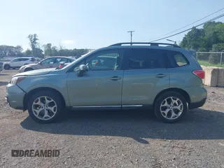 2017 Subaru Forester Touring with VIN JF2SJAWC8HH579492, listed as a IAAI auction lot 42571986 with 57,228 mi miles and . Bid and sale history available at DreamBid. Image 14.
