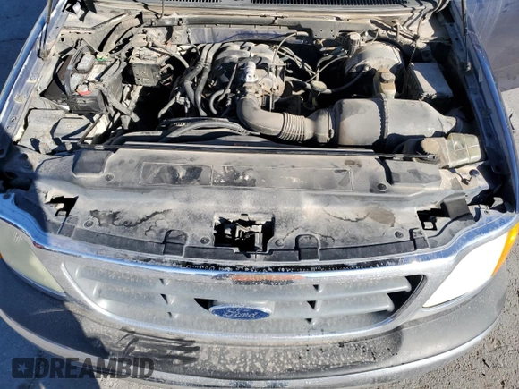 2004 Ford F-150 XL z VIN 2FTRF07274CA23500, wystawiony jako Copart lot #88761275 z przebiegiem 257 573 mil mil oraz Szkoda całkowita • Salvage title. Historia ofert i sprzedaży dostępna na DreamBid. Obrazek 13.