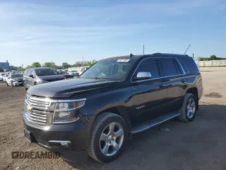 2015 Chevrolet Tahoe LTZ z VIN 1GNSKCKC1FR101328, wystawiony jako Copart lot #56212905 z przebiegiem 167 789 mil mil oraz Szkoda całkowita • Salvage title. Historia ofert i sprzedaży dostępna na DreamBid. Obrazek 1.