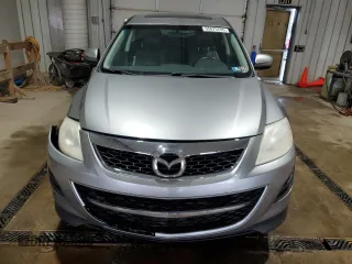 2012 Mazda CX-9 Touring z VIN JM3TB3CV5C0347593, wystawiony jako Copart lot #55675705 z przebiegiem 179 777 mil mil oraz Szkody całkowita. Historia ofert i sprzedaży dostępna na DreamBid. Obrazek 5.