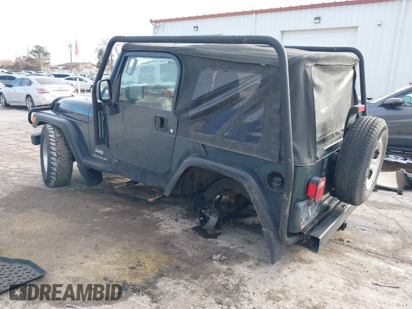 2005 Jeep Wrangler SE with VIN 1J4FA29S45P333916, listed as a IAAI auction lot 41214841 with 90,577 mi miles. Bid and sale history available at carsss.com. Image 3.