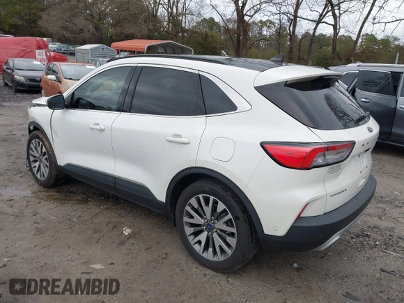 2020 Ford Escape Titanium Hybrid with VIN 1FMCU9DZ0LUC56274, listed as a IAAI auction lot 41256530 with 43,502 mi miles and . Bid and sale history available at DreamBid. Image 3.