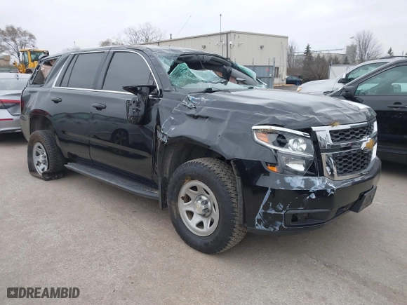2017 Chevrolet Tahoe Commercial with VIN 1GNSKFEC3HR201575, listed as a IAAI auction lot 40974289 with 144,463 mi miles. Bid and sale history available at carsss.com. Image 1.
