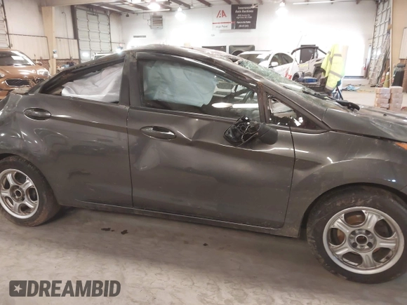 2015 Ford Fiesta SE with VIN 3FADP4BJ7FM218586, listed as a IAAI auction lot 41603479 with 97,460 mi miles. Bid and sale history available at carsss.com. Image 13.