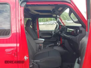 2020 Jeep Wrangler Unlimited Freedom with VIN 1C4HJXDG5LW282721, listed as a IAAI auction lot 42268956 with 47,245 mi miles and . Bid and sale history available at DreamBid. Image 5.