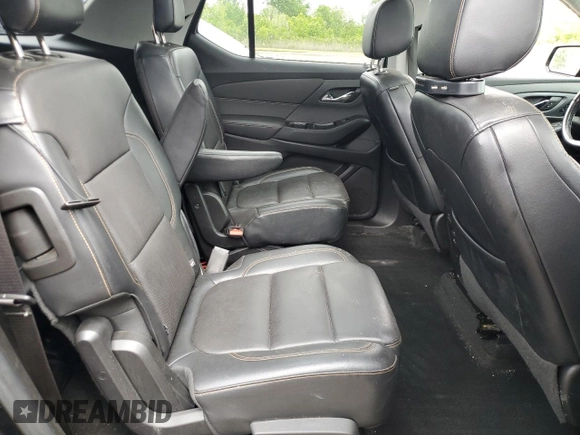 2018 Chevrolet Traverse Premier z VIN 1GNEVJKW7JJ150494, wystawiony jako Copart lot #58755745 z przebiegiem 193 346 mil mil oraz Czysty tytuł • Clean title. Historia ofert i sprzedaży dostępna na DreamBid. Obrazek 11.