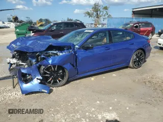 2023 BMW 8 Series M850i z VIN WBAGV8C08PCK41272, wystawiony jako Copart lot #77442574 z przebiegiem Nie podano mil oraz Szkoda całkowita • Salvage title. Historia ofert i sprzedaży dostępna na DreamBid. Obrazek 1.