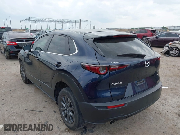 2021 Mazda CX-30 S with VIN 3MVDMAAL4MM302042, listed as a IAAI auction lot 42288275 with 39,821 mi miles and . Bid and sale history available at DreamBid. Image 3.