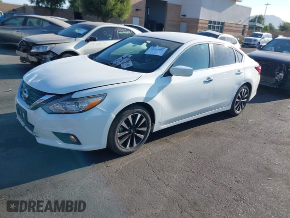 2018 Nissan Altima 2.5 S with VIN 1N4AL3AP8JC254733, listed as a IAAI auction lot 40212001 with 148,347 mi miles. Bid and sale history available at carsss.com. Image 2.