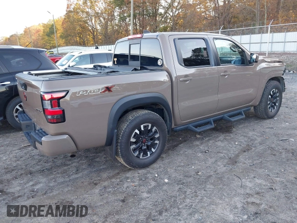 2022 Nissan Frontier SV z VIN 1N6ED1EJ3NN648912, wystawiony jako IAAI lot #40888927 z przebiegiem 59 633 mil mil oraz . Historia ofert i sprzedaży dostępna na DreamBid. Obrazek 4.