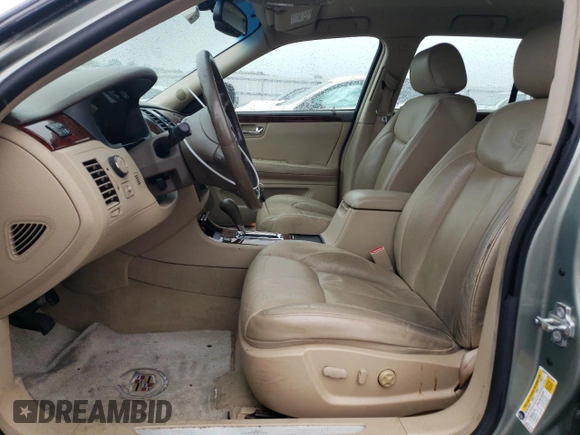 2006 Cadillac DTS 1SC z VIN 1G6KD57Y26U182388, wystawiony jako Copart lot #71929184 z przebiegiem 91 711 mil mil oraz Szkoda całkowita • Salvage title. Historia ofert i sprzedaży dostępna na DreamBid. Obrazek 7.