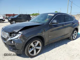 2016 BMW X4 xDrive28i with VIN 5UXXW3C50G0R20354, listed as a Copart auction lot 51261723 with 65,152 mi miles. Bid and sale history available at carsss.com. Image 1.