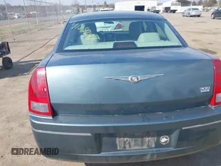 2005 Chrysler 300 with VIN 2C3JA53G35H157178, listed as a IAAI auction lot 41849007 with 149,247 mi miles. Bid and sale history available at carsss.com. Image 15.