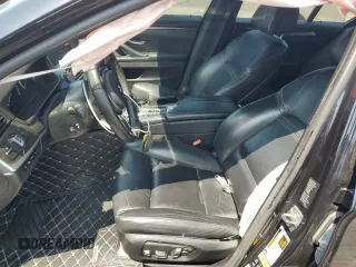 2016 BMW 5 Series 550i xDrive with VIN WBAKP9C52GG587591, listed as a Copart auction lot 58402505 with 94,384 mi miles and Salvage title. Bid and sale history available at DreamBid. Image 7.