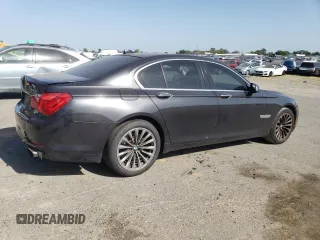 2012 BMW 7 Series 740i with VIN WBAKA4C54CC613419, listed as a Copart auction lot 54420885 with 104,006 mi miles and Salvage Title. Bid and sale history available at carsss.com. Image 3.