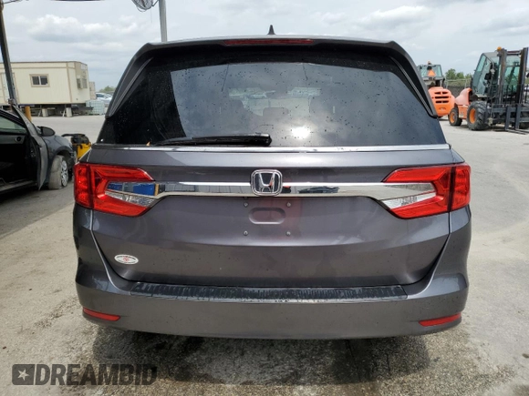 2019 Honda Odyssey EX-L with VIN 5FNRL6H75KB004911, listed as a Copart auction lot 48954335 with 74,720 mi miles and Clean Title. Bid and sale history available at carsss.com. Image 6.
