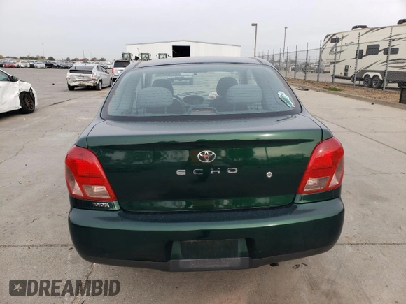 2000 Toyota ECHO with VIN JTDAT1233Y0080978, listed as a Copart auction lot 81164804 with 80,335 mi miles and Salvage Title. Bid and sale history available at DreamBid. Image 6.