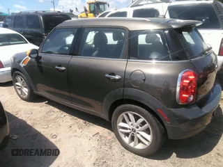 2012 MINI Countryman with VIN WMWZB3C53CWM29495, listed as a IAAI auction lot 42196053 with 77,741 mi miles and . Bid and sale history available at DreamBid. Image 3.