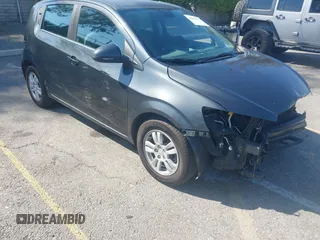 2014 Chevrolet Sonic LT with VIN 1G1JC6SG4E4118781, listed as a IAAI auction lot 41862192 with 124,375 mi miles. Bid and sale history available at carsss.com. Image 6.