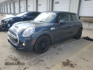 2015 MINI Hardtop S with VIN WMWXP7C59F2A34428, listed as a Copart auction lot 50697285 with 131,564 mi miles and Salvage Title. Bid and sale history available at DreamBid. Image 1.