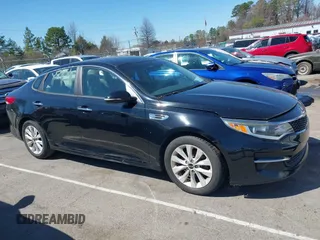2016 Kia Optima LX with VIN 5XXGT4L3XGG013835, listed as a IAAI auction lot 41815349 with 120,628 mi miles and . Bid and sale history available at carsss.com. Image 13.