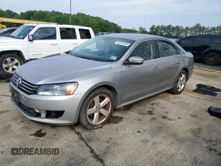 2014 Volkswagen Passat S with VIN 1VWAT7A32EC022582, listed as a Copart auction lot 63142455 with 103,762 mi miles and Clean title. Bid and sale history available at DreamBid. Image 1.