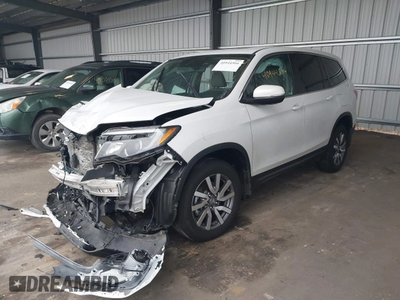 2022 Honda Pilot EX-L with VIN 5FNYF6H58NB097283, listed as a IAAI auction lot 40944566 with 22,027 mi miles and . Bid and sale history available at DreamBid. Image 17.