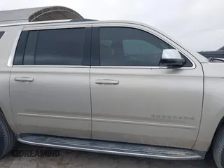 2017 Chevrolet Suburban Premier with VIN 1GNSCJKC4HR183592, listed as a IAAI auction lot 41514348 with 144,460 mi miles and . Bid and sale history available at DreamBid. Image 14.