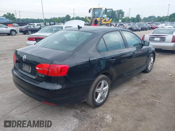 2011 Volkswagen Jetta SE with VIN 3VWDX7AJ7BM052493, listed as a IAAI auction lot 42745045 with 179,732 mi miles and . Bid and sale history available at DreamBid. Image 4.