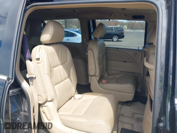 2006 Honda Odyssey EX-L z VIN 5FNRL387X6B055048, wystawiony jako IAAI lot #41974961 z przebiegiem 123 361 mil mil oraz . Historia ofert i sprzedaży dostępna na DreamBid. Obrazek 5.