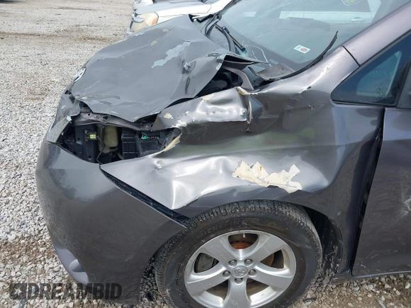 2013 Toyota Sienna LE AAS with VIN 5TDKK3DC0DS301315, listed as a IAAI auction lot 42215454 with 328,507 mi miles and . Bid and sale history available at DreamBid. Image 6.