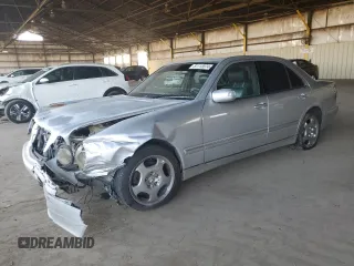 2001 Mercedes-Benz E-Class with VIN WDBJF70J51B167821, listed as a Copart auction lot 81113074 with 203,608 mi miles and Salvage Title. Bid and sale history available at carsss.com. Image 1.