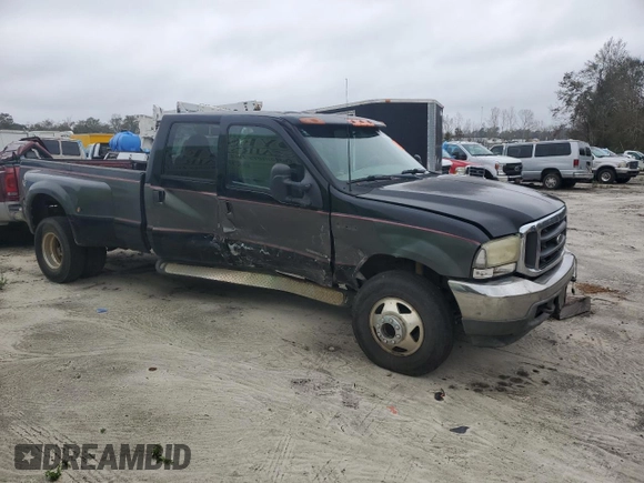 2002 Ford F-350 XL z VIN 1FTWW33F92EB51645, wystawiony jako Copart lot #79216984 z przebiegiem Nie podano mil oraz Szkoda całkowita • Salvage title. Historia ofert i sprzedaży dostępna na DreamBid. Obrazek 4.