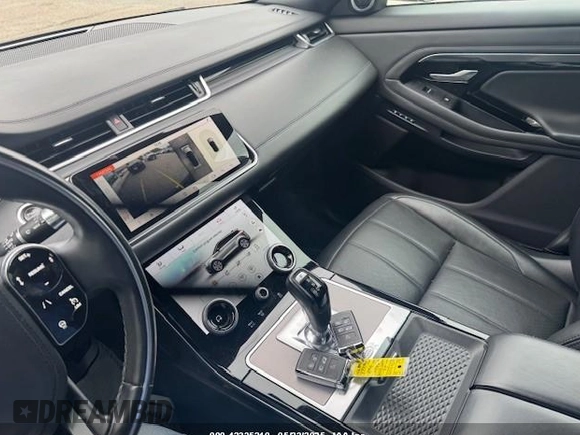 2020 Land Rover Range Rover Evoque SE z VIN SALZP2FX3LH001452, wystawiony jako IAAI lot #42335210 z przebiegiem 99 827 mil mil oraz . Historia ofert i sprzedaży dostępna na DreamBid. Obrazek 12.