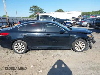 2016 Kia Optima EX z VIN 5XXGU4L35GG066083, wystawiony jako IAAI lot #41828804 z przebiegiem 112 396 mil mil oraz . Historia ofert i sprzedaży dostępna na DreamBid. Obrazek 13.