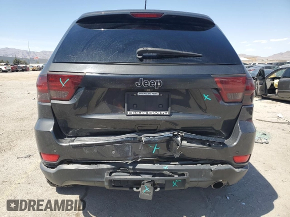 2011 Jeep Grand Cherokee Limited z VIN 1J4RR5GG0BC612109, wystawiony jako Copart lot #53918985 z przebiegiem 194 173 mil mil oraz Szkoda całkowita • Salvage title. Historia ofert i sprzedaży dostępna na DreamBid. Obrazek 6.