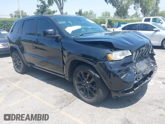 2018 Jeep Grand Cherokee Altitude with VIN 1C4RJEAG2JC428536, listed as a IAAI auction lot 42472960 with 74,631 mi miles and . Bid and sale history available at DreamBid. Image 1.