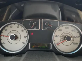 2009 Ford Taurus Limited z VIN 1FAHP25W59G101519, wystawiony jako Copart lot #55035935 z przebiegiem 142 496 mil mil oraz Szkody całkowita. Historia ofert i sprzedaży dostępna na DreamBid. Obrazek 9.