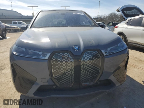 2022 BMW iX xDrive50 with VIN WB523CF08NCK67378, listed as a Copart auction lot 42077724 with 13,948 mi miles. Bid and sale history available at carsss.com. Image 5.