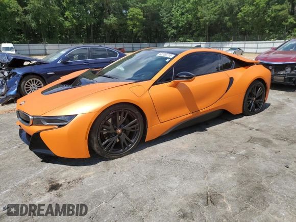 2015 BMW i8 z VIN WBY2Z2C55FV391447, wystawiony jako Copart lot #60150713 z przebiegiem 84 305 mil mil oraz . Historia ofert i sprzedaży dostępna na DreamBid. Obrazek 1.