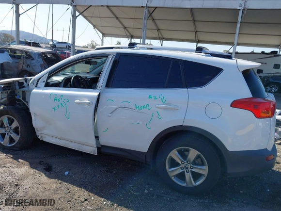 2015 Toyota RAV4 XLE with VIN JTMWFREV9FJ034992, listed as a IAAI auction lot 41922694 with 100,956 mi miles. Bid and sale history available at carsss.com. Image 15.