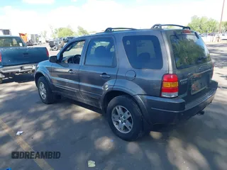 2003 Ford Escape Limited with VIN 1FMCU94173KB02067, listed as a IAAI auction lot 42088659 with 236,209 mi miles. Bid and sale history available at carsss.com. Image 3.